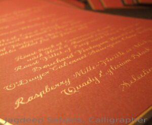 A stunning hand-lettered anniversary dinner menu by Jagdeep Sahans of Soul Scribe Calligraphy. Exquisite gold ink on vibrant magenta paper creates pure elegance.